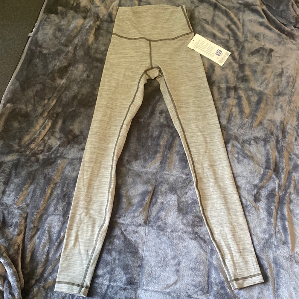 Size 2 navy green lululemon leggings. 28”